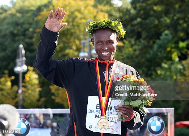 Geoffrey Mutai of Kenya poses after winning the 39th Berlin Marathon on September 30, 2012 in Berlin, Germany.