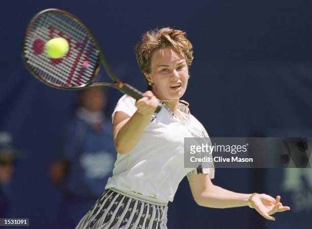 Martina Hingis of Switzerland in action on her way to victory over Mary Pierce of France in the Ladies final of the Ford Australian Open at Melbourne...