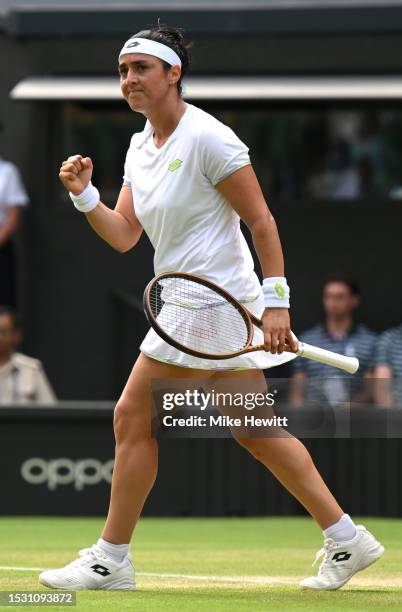Ons Jabeur of Tunisia celebrates against Petra Kvitova of Czech Republic in the Women's Singles fourth round match during day eight of The...