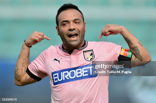 Fabrizio Miccoli of Palermo celebrates after scoring the opening goal during the Serie A match between US Citta di Palermo and AC Chievo at Stadio...