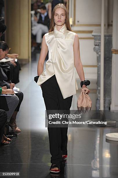 Model walks the runway at the Celine Spring Summer 2013 fashion show during Paris Fashion Week on September 30, 2012 in Paris, France.