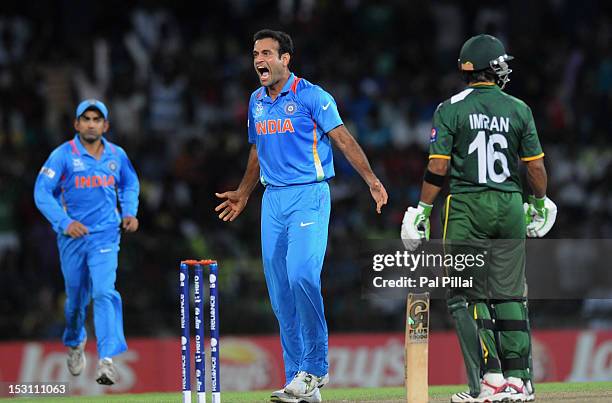 Imran Nazir of Pakistan looks on as Irfan Pathan of India celebrates after taking his wicket during the ICC T20 World Cup, Super Eight group 2...