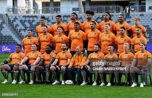 Australia's rugby players pose for a team photo prior to a training session in Sydney on July 14 ahead of their Rugby Championship match against...