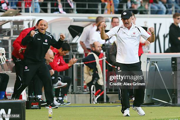 Head coach Armin Veh of Frankfurt celebrates after the Bundesliga match between Eintracht Frankfurt and SC Freiburg at Commerzbank-Arena on September...