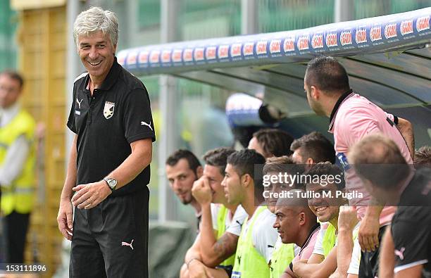 Coach Gian Piero Gasperini of Palermo smiles in the bench during the Serie A match between US Citta di Palermo and AC Chievo at Stadio Renzo Barbera...