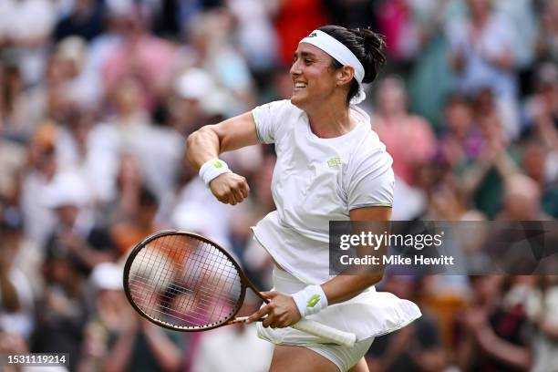 Ons Jabeur of Tunisia celebrates victory against Petra Kvitova of Czech Republic in the Women's Singles fourth round match during day eight of The...
