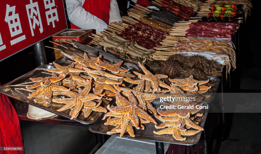 Exotic Food Traditional Chinese Street Food At The Night Market exotic-food-traditional-chinese-street-food-at-the-night-market