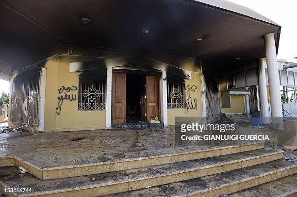 Picture shows a burnt building at the US consulate compound in the eastern Libyan city of Benghazi on September 13, 2012 following an attack late on...