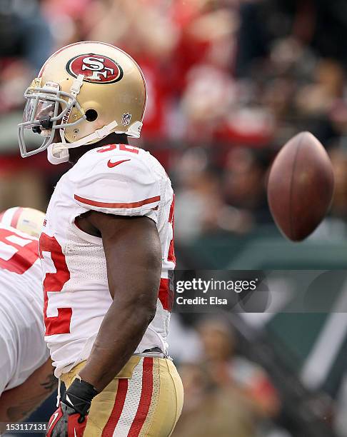 Kendall Hunter of the San Francisco 49ers celebrates his touchdown in the fourth quarter against the New York Jets on September 30, 2012 at MetLife...