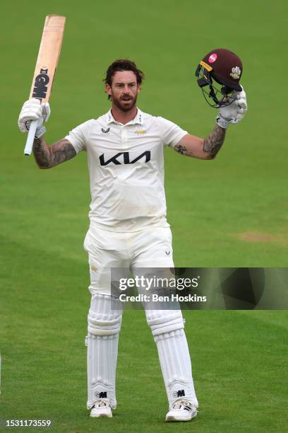 Jordan Clark of Surrey celebrates reaching his century during day one of the LV= Insurance County Championship Division 1 match between Surrey and...