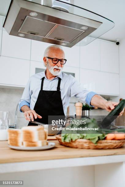 handsome senior chef working as food vlogger - television icon stock pictures, royalty-free photos & images