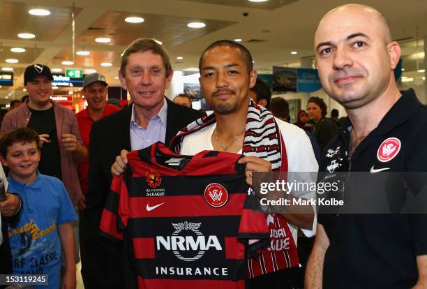 Western Sydney Wanderers CEO Lyall Gorman poses with Shinji Ono after his arrival at Sydney International Airport on October 1, 2012 in Sydney,...
