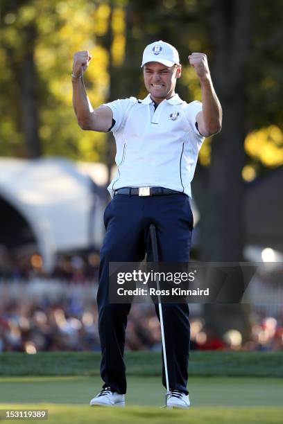 Martin Kaymer of Europe celebrates after making the winning putt on the 18th green to win The 39th Ryder Cup at Medinah Country Club on September 30,...