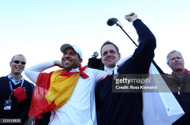 Sergio Garcia and Luke Donald celebrate after Europe defeated the USA 14.5 to 13.5 to retain the Ryder Cup during the Singles Matches for The 39th...