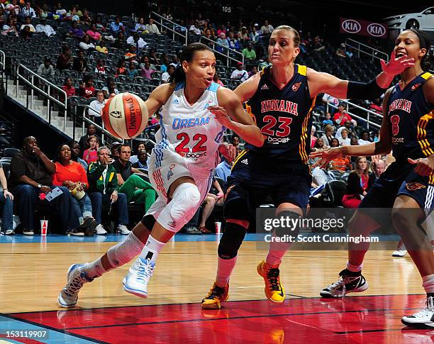 Armintie Price of the Atlanta Dream drives against Katie Douglas of the Indiana Fever during Game 2 of the Eastern Conference Semi-Finals at Philips...