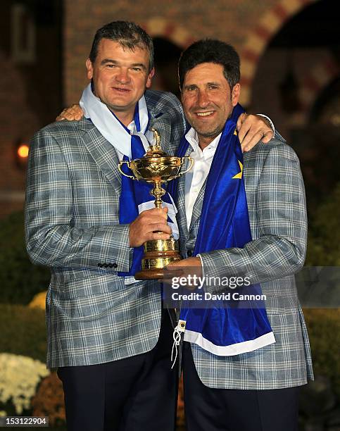 European team captain Jose Maria Olazabal poses with Paul Lawrie and the Ryder Cup after Europe defeated the USA 14.5 to 13.5 to retain the Ryder Cup...