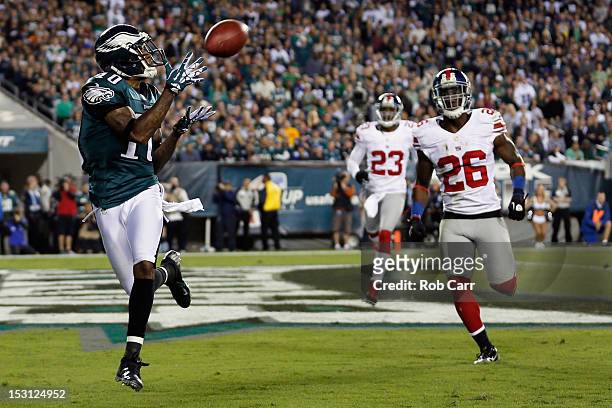 Wide receiver DeSean Jackson of the Philadelphia Eagles catches a touchdown pass in front of free safety Antrel Rolle of the New York Giants during...