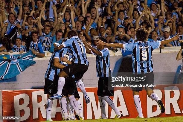 Werley, Marcelo Moreno and Kleber celebrate a goal during the match between Gremio and Santos as part of the brazilian championship at Olimpico...