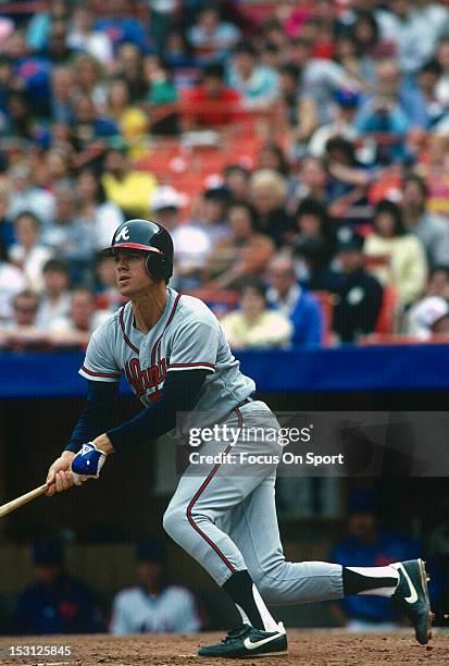 Dale Murphy of the Atlanta Braves bats against the New York Mets during an Major League Baseball game circa 1988 at Shea Stadium in the Queens...