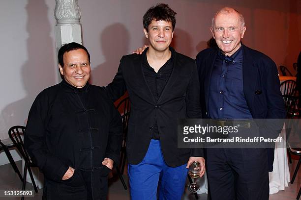 Azzedine Alaia, Adel Abdessemed, and Francois Pinault, PPR Honorary President, attend a private dinner hosted by designer Azzedine Alaia in honor of...