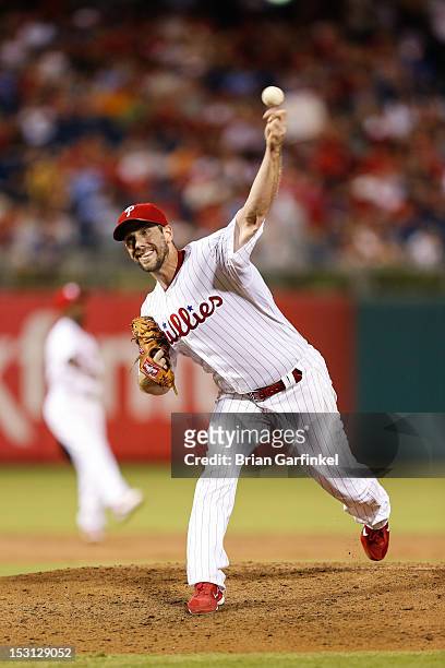 Starting pitcher Cliff Lee of the Philadelphia Phillies throws a pitch during the game against the Colorado Rockies at Citizens Bank Park on...