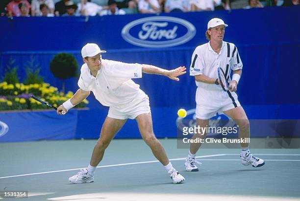 Mark Woodforde and Todd Woodbridge doubles partners from Australia in action. During the Australian open at Flinders Park in Melbourne, Australia. T...