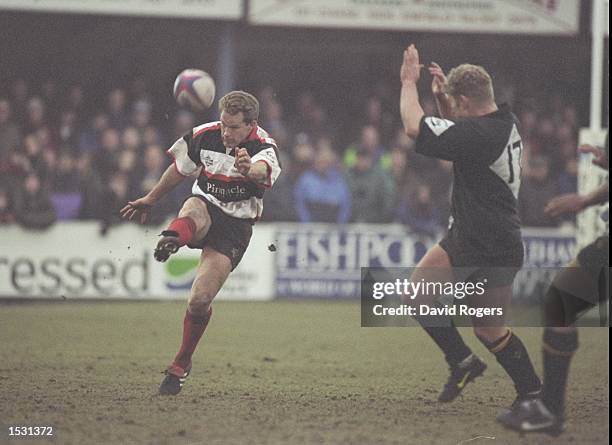 Michael Lynagh of Saracens kick for touch during the Pilkington Cup 5th round match against Wasps at Enfield, London. Saracens beat Wasps 21-17....