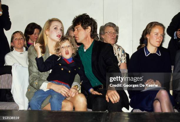 Mick Jagger, Jerry Hall and their son James on 1990 circa.