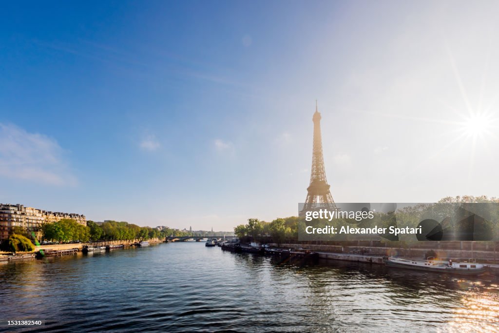 Seine river and Eiffel Tower on a sunny summer day, Paris, France
