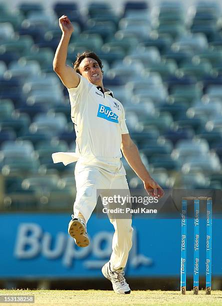 Will Sheridan of the Bushrangers bowls during day two of the Sheffield Shield match between the Western Australia Warriors and the Victorian...