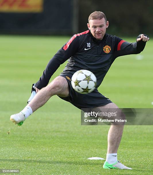 Wayne Rooney of Manchester United in action during a first team training session, ahead of their UEFA Champions League match against Cluj, at...