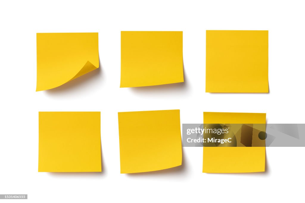 A Set of Blank Yellow Adhesive Notes Isolated on White