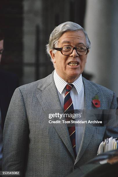 British former Deputy Prime Minister Geoffrey Howe leaves his London home the day after his resignation from Margaret Thatcher's cabinet, 2nd...