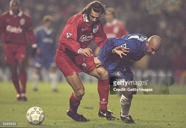 Patrick Berger of Liverpool tangles with Gianluca Vialli of Chelsea. During the FA cup fourth round match between Chelsea and Liverpool at Stamford...
