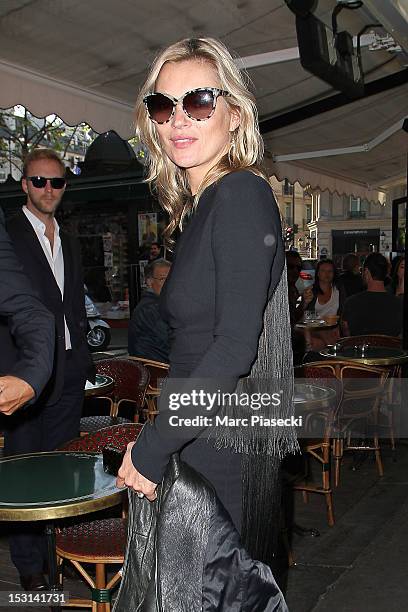 Model Kate Moss arrives at 'Cafe de Flore' on October 1, 2012 in Paris, France.