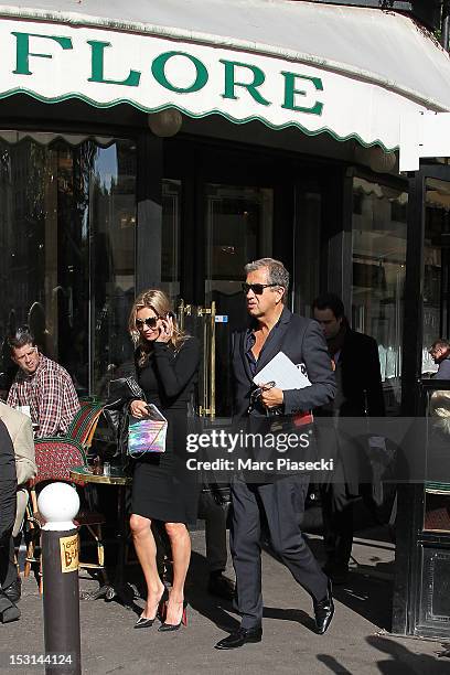 Model Kate Moss and Mario Testino are seen leaving the 'Cafe de Flore' on October 1, 2012 in Paris, France.