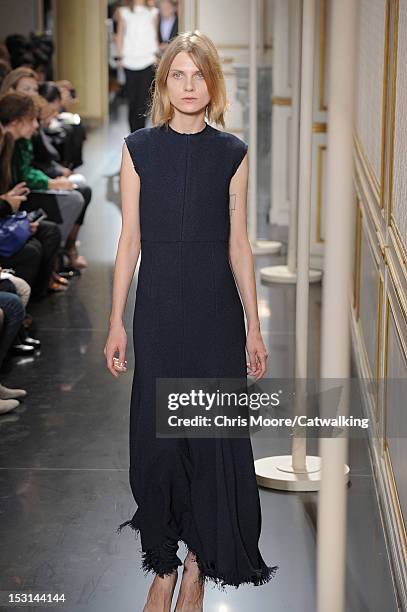 Model walks the runway at the Celine Spring Summer 2013 fashion show during Paris Fashion Week on September 30, 2012 in Paris, France.