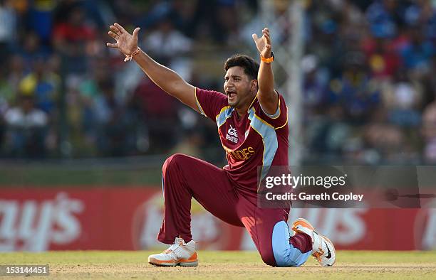 Ravi Rampaul of the West Indies successfully appeals for the wicket of Rob Nicol of New Zealand during the ICC World Twenty20 2012 Super Eights Group...