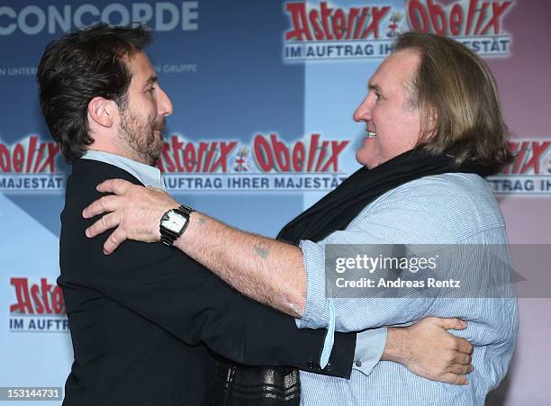 Edouard Baer and Gerard Depardieu attend the 'Asterix & Obelix - God Save Britannia' photocall at Hotel de Rome on October 1, 2012 in Berlin, Germany.