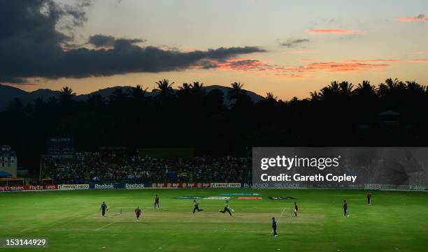 James Franklin and Ross Taylor of New Zealand run between the wickets during the ICC World Twenty20 2012 Super Eights Group 1 match between the West...