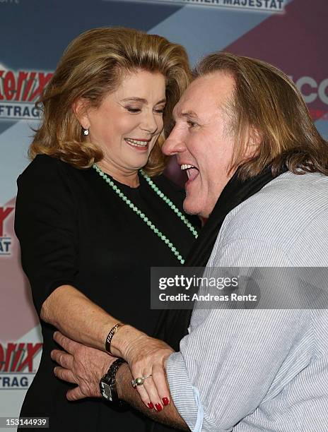Catherine Deneuve and Gerard Depardieu attend the 'Asterix & Obelix - God Save Britannia' photocall at Hotel de Rome on October 1, 2012 in Berlin,...