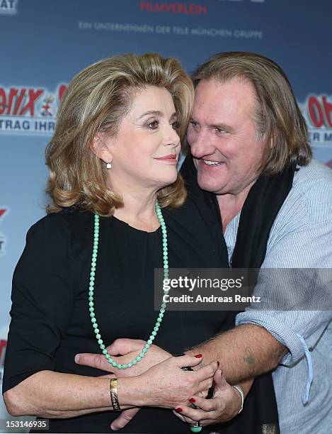 Catherine Deneuve and Gerard Depardieu attend the 'Asterix & Obelix - God Save Britannia' photocall at Hotel de Rome on October 1, 2012 in Berlin,...