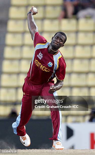 Darren Sammy of West Indies bowls during the Super Eights Group 1 match between New Zealand and West Indies at Pallekele Cricket Stadium on October...