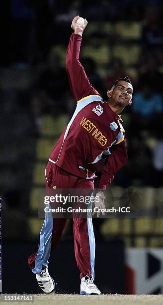 Sunil Narine of West Indies bowls during the Super Eights Group 1 match between New Zealand and West Indies at Pallekele Cricket Stadium on October...