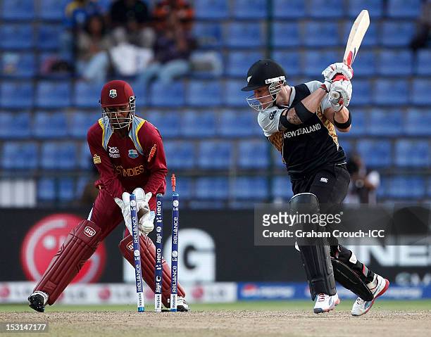 Brendon McCullum of New Zealand is bowled by Samuel Badree of West Indies during the Super Eights Group 1 match between New Zealand and West Indies...
