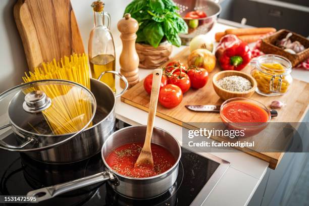 ingredients for traditional italian spaghetti recipe - sauce stock pictures, royalty-free photos & images