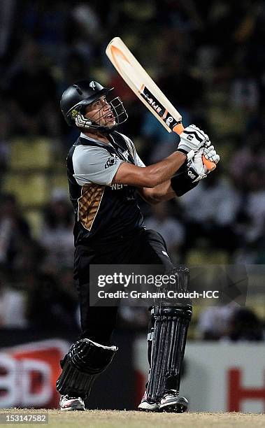 Ross Taylor of New Zealand hits a six during the Super Over in the Super Eights Group 1 match between New Zealand and West Indies at Pallekele...