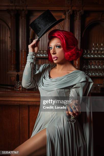 a beautiful elegant 1920s style redhead drag queen in a luxury stately home - flapper stock pictures, royalty-free photos & images