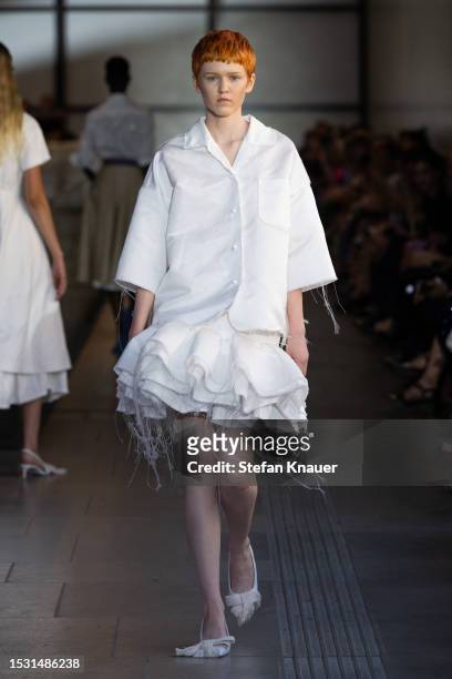 Model walks the runway at the Odeeh X NEWEST runway show during the Berlin Fashion Week SS24 at James-Simon-Galerie on July 10, 2023 in Berlin,...