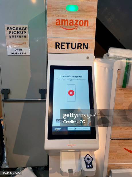 An Amazon Returns center kiosk QR Code scanner is seen in a Whole Foods, Manhattan, New York.